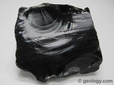 <p>Texture of igneous rocks with no mineral grains due to molten rock being quenched quickly as it was ejected into the atmosphere</p>