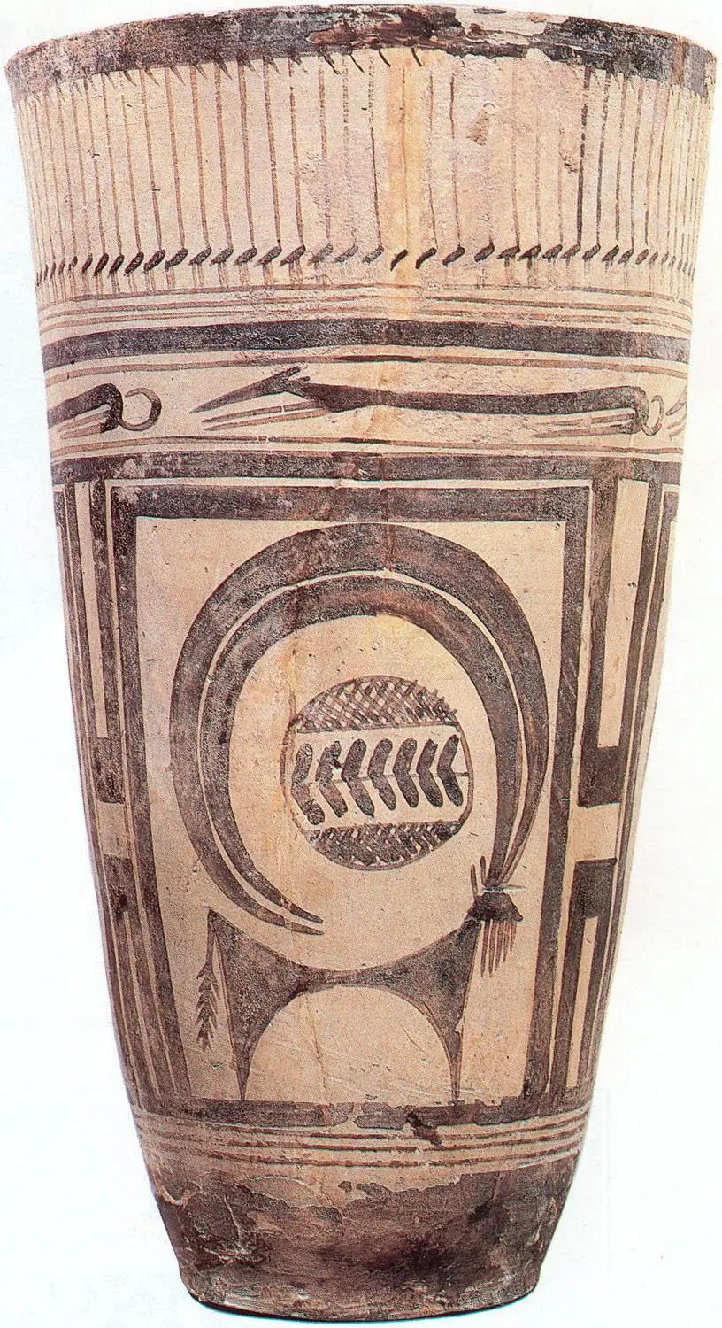 <p>A funerary beaker divided into registers depicting long necked birds on the upper frieze, narrow dogs below the frieze, and an ibex framed by a symbol that may have represented agricultural fields. The ibex may have been a clan symbol.</p>