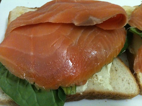 to smoke as in meats or fish