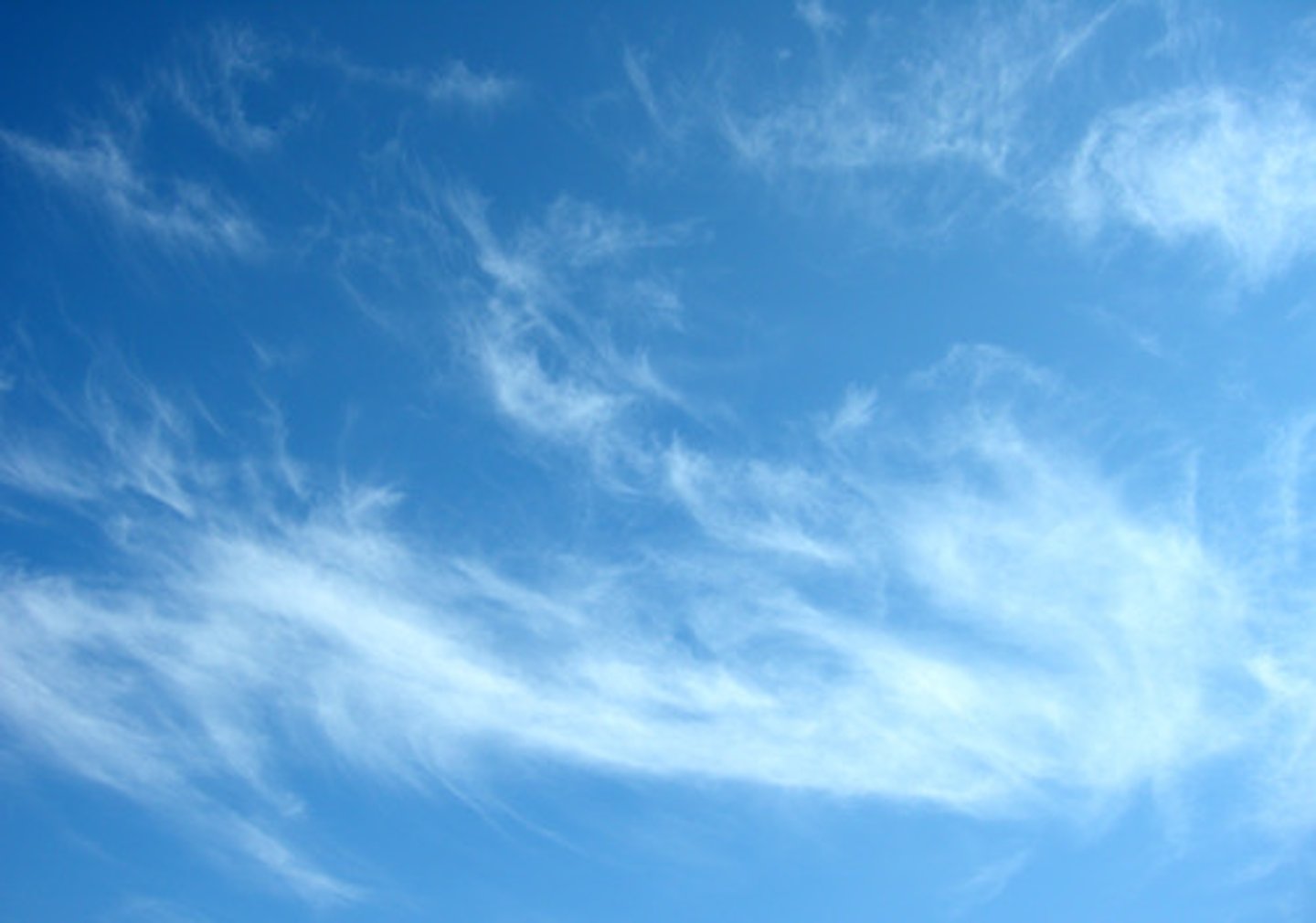 <p>wispy, feathery clouds</p>