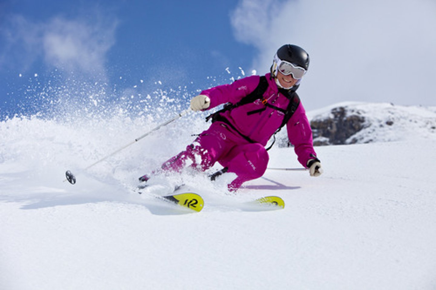 <p>skier (elle)</p>