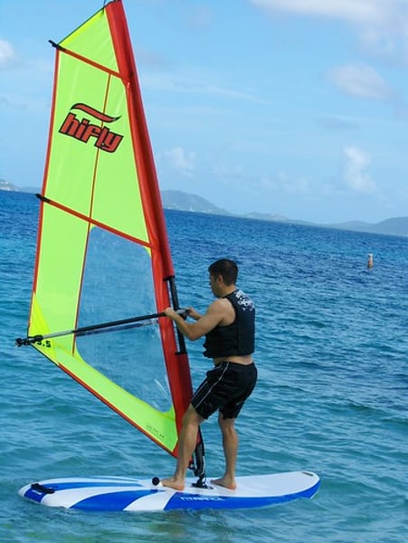 <p>to windsurf / to go windsurfing</p>