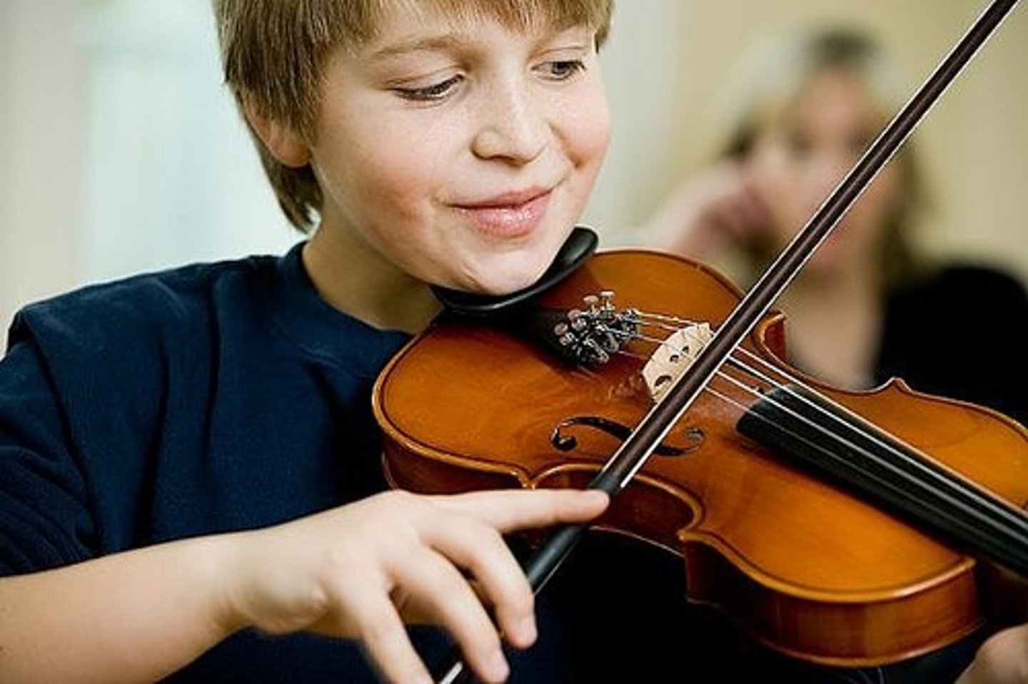 <p>Playing a Violin</p>