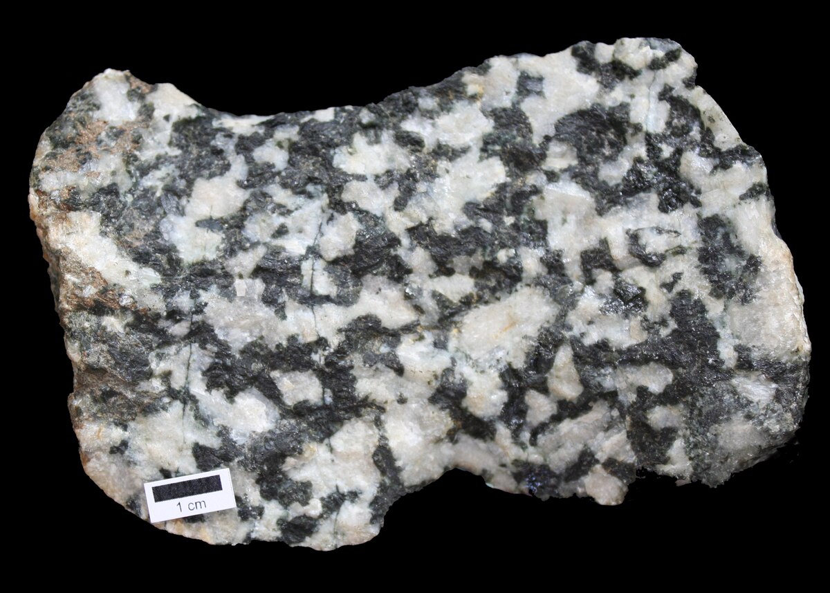 <p>Identify the igneous rock, its texture, and composition</p>