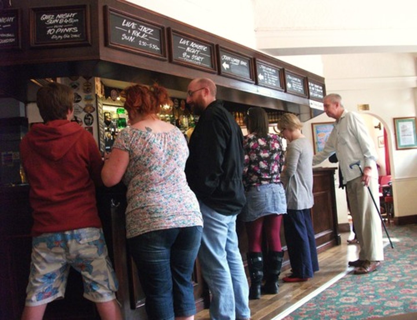 <p>A group of customers</p>
