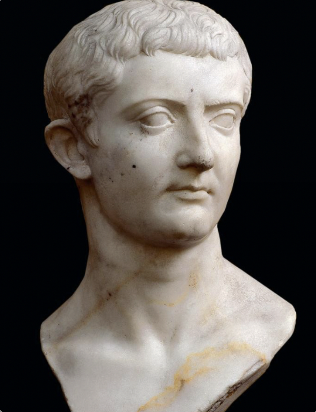 Tiberius was the son of Livia, a supporter of Augustus, u can see that bc this sculpture is similar to his by embracing the young look forever 