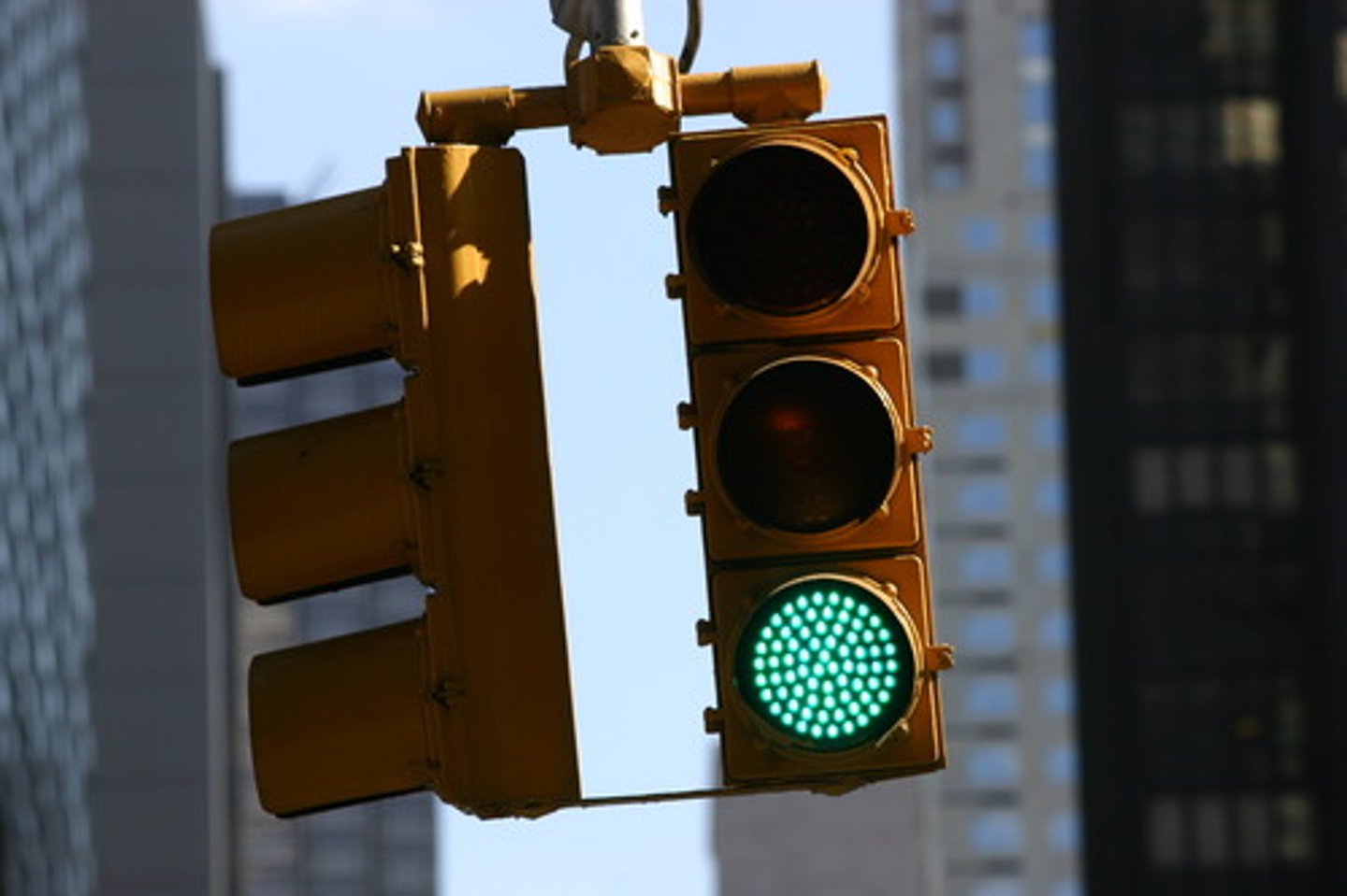 <p>You may TRAVEL LEFT. You may turn left only if the way is clear. This is an unprotected turn, and you must YIELD to oncoming traffic.</p>