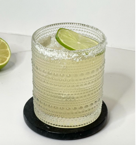 <p>Ingredients: <em>Don Julio reposado, Grand Marnier, fresh lime</em></p><p>Garnish: Fresh lime wheel and fine sea salt rim, Straw: No </p><p>Tagline: A premium, full bodied margariate with reposado tequila. Grand marnier lends rich, orange notes with some vanilla. Fresh lime juice brightens up the flavours and helps to balance the sweetness of the Grand Marnier and simple syrup.</p>