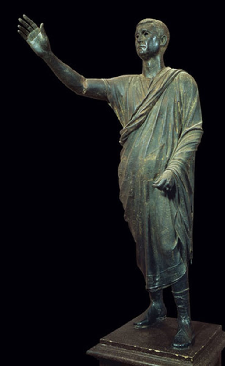 <p>Italy, 80 BCE, bronze, Republican Rome</p><p>The image, status, and stature of the magistrate in the course of performing the duties of his office commands respect.</p>