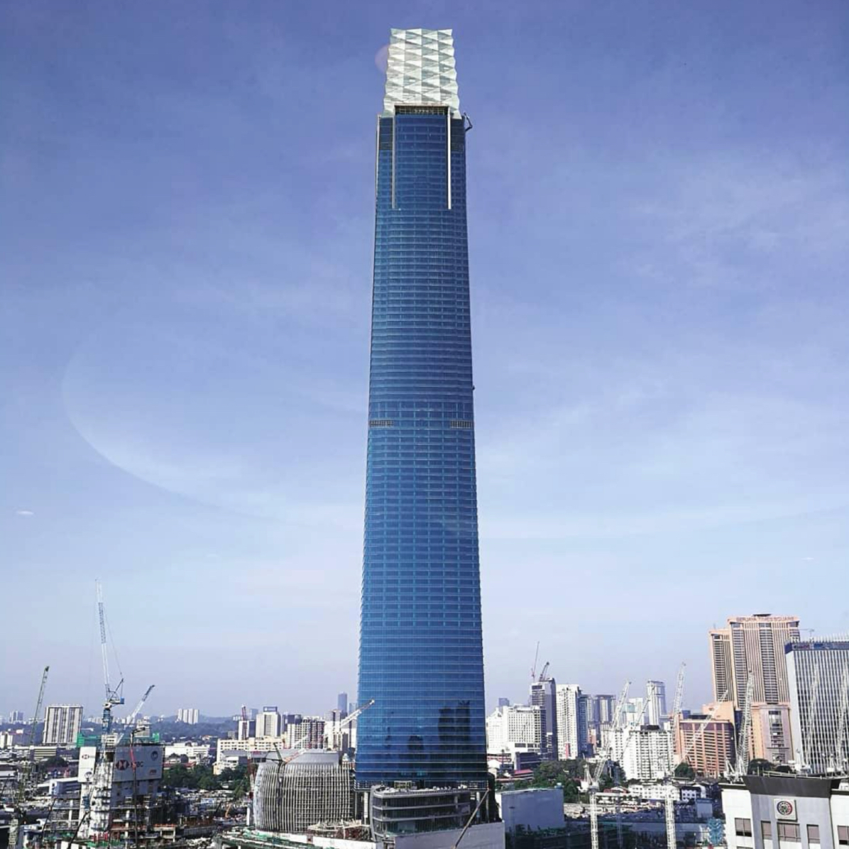 <ul><li><p><span>Architects: Mulia Group + PNB.</span></p></li></ul><ul><li><p><span>Details: 492m glass-clad supertall skyscraper in TRX financial district.</span></p></li><li><p><span>Significance: Contemporary global finance hub architecture.</span></p></li></ul><p></p>