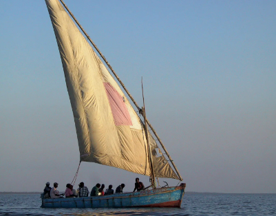 triangular sail that made it possible to sail against the wind; used in the Indian Ocean trade