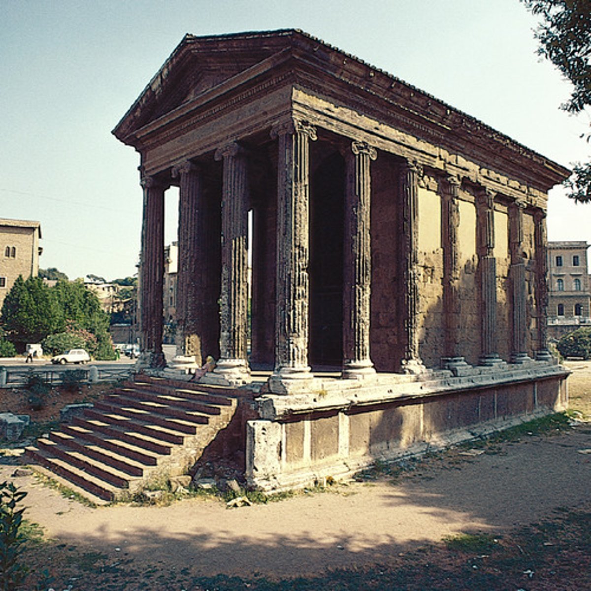 <p>is one with free standing columns in the front (colonnaded portico) whereas the columns along the sides are engaged in the peripheral walls of the naos or cella.</p>