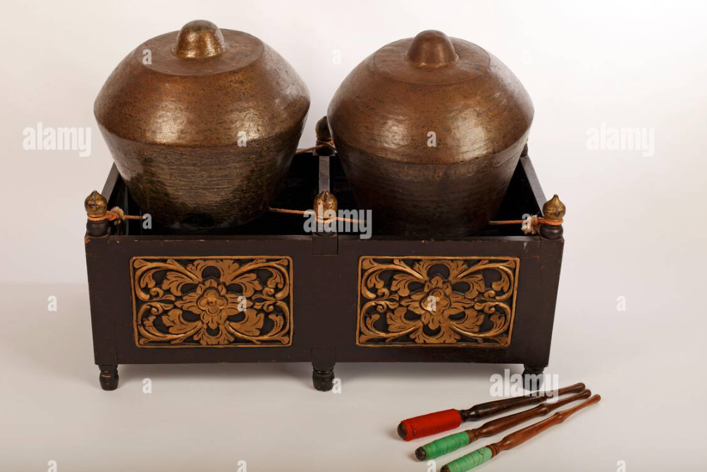 <p>A set of small gongs placed on a rack in a gamelan ensemble.</p>