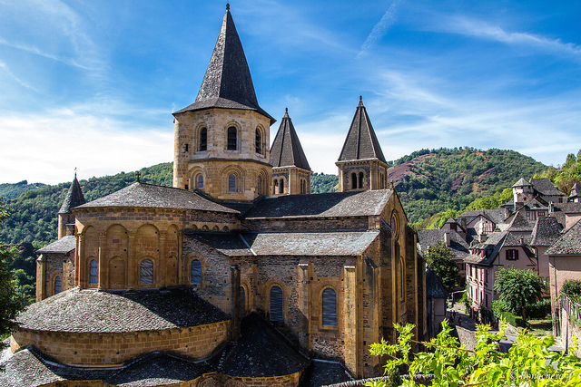 <p>Church of Sainte-Foy Conques, France. Romanesque Europe. Church: c. 1050-1130 C.E.; Reliuary of Saint Foy: ninth century C.E.; with later additions. Stone (architecture); stone and paint (tympanum); gold, silver, gemstone, and enamel over wood (reliquary) One can see some of the most fabulous golden religious objects in France, including the very famous gold and jewel-encrusted reliquary statue of St. Foy. The Church of Saint Foy at Conques provides an excellent example of Romanesque art and architecture</p>