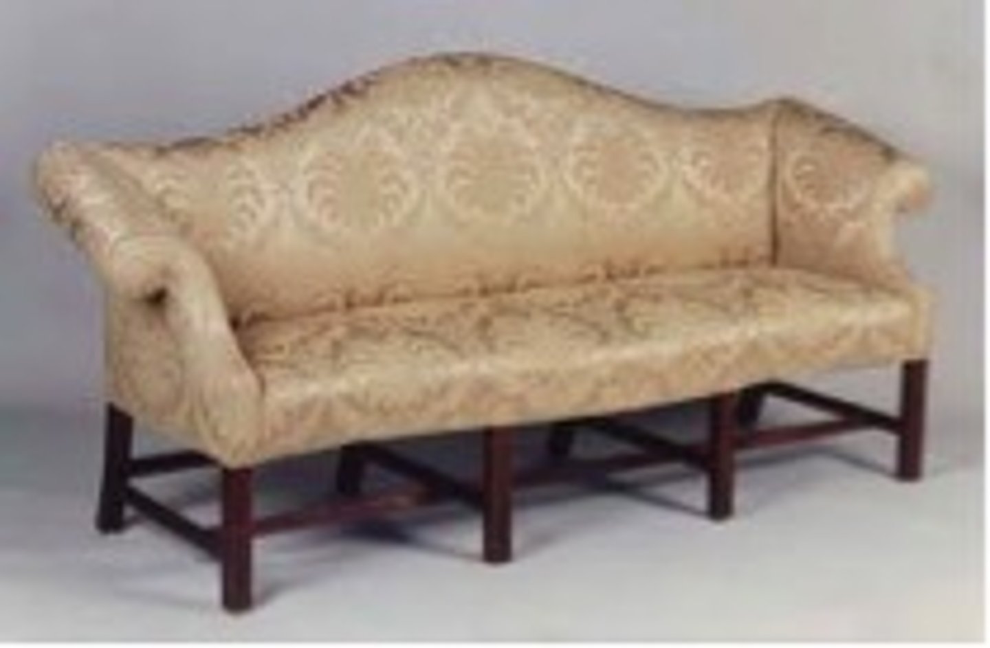 <p>has a curved back that looks like a camel hump; characterized by straight lines and a long individual cushion for the seat</p><p>innovation of Thomas Chippendale</p>