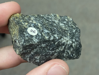 <p>Not smooth or rough, yellow and white spots, <strong>Igneous</strong></p>