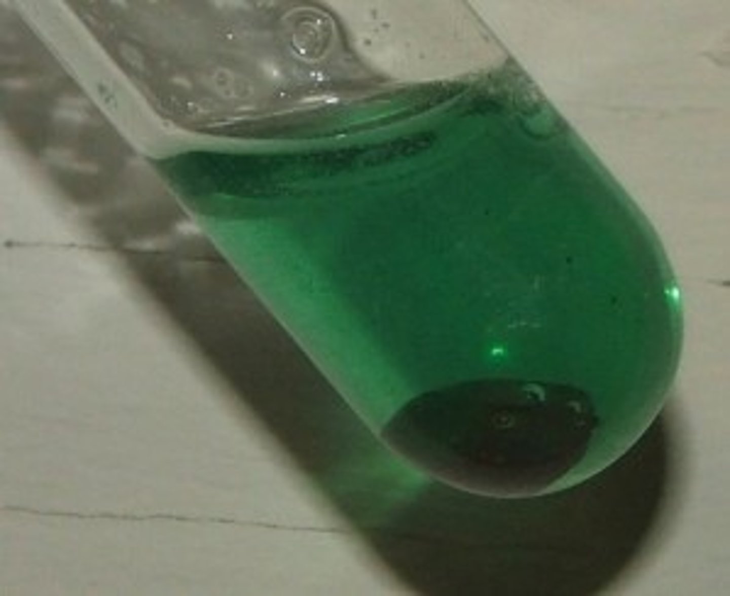 <p>Green precipitate produced</p>