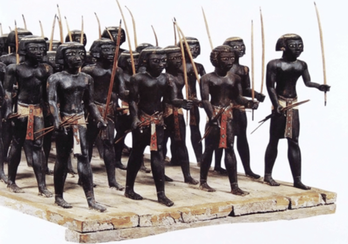 <p>- Tomb model found in an Egyptian tomb, implies that it is not threatening to the tomb owner and is likely protective</p><p>- Displays Nubians</p><p>- Dark skin color</p><p>- Bows and arrows (Numbians known for being skilled archers)</p><p>- Patterned clothing</p><p>- Hair</p><p>- Nubians were a part of the Egyptian military during the Middle Kingdom, but texts from this time will often paint them in a poor light</p><p>- Contradictory</p><p>- Clearly Nubians were able to go into Egypt and live without conflict at this time</p>