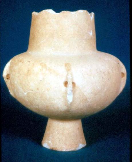 <p>Cycladic marble vessel with a gold patina</p>