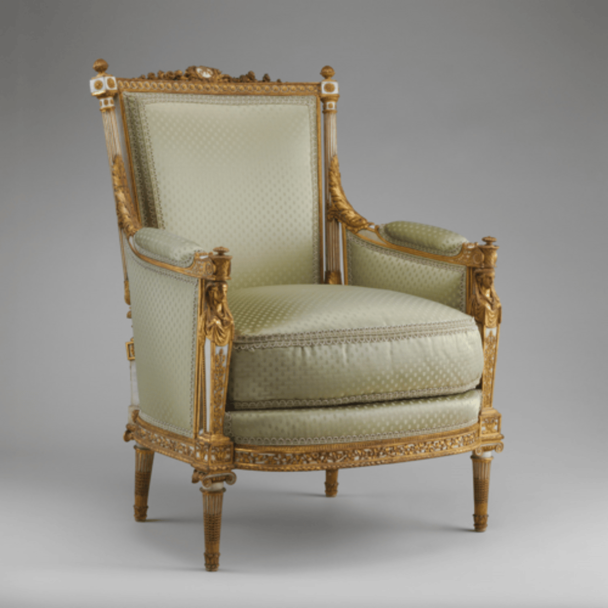 <p>French exposed-wood frame, overstuffed upholstered chair, An armchair with closed arms</p>