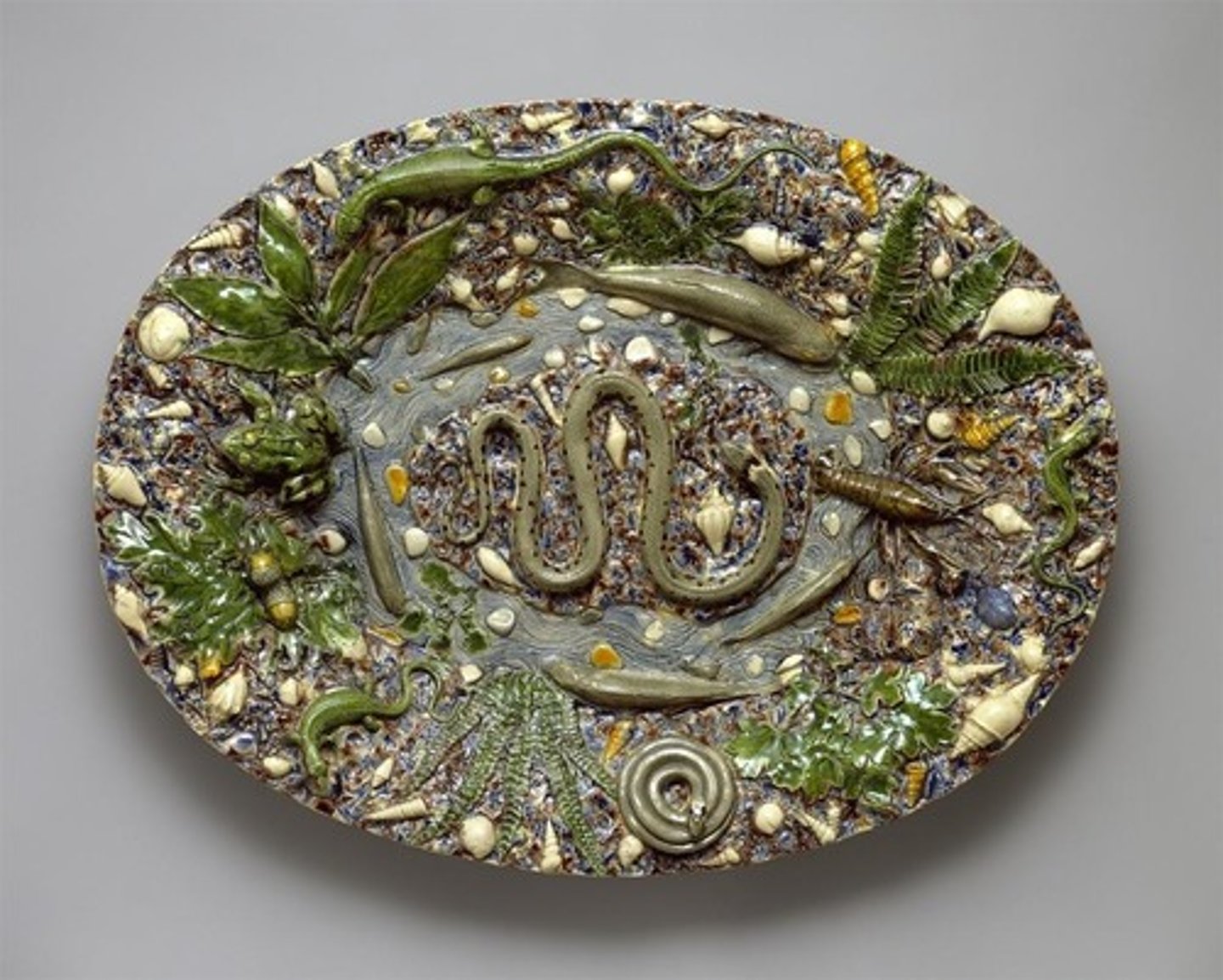 <p>Succeeded in producing a widely imitated pottery, admired for smooth glazes in richly colored enamels. He was appointed as royal potter to Catherine de Medici reproducing scriptural and mythological subject in low relief and for his rustic pieces decorated with <span class="bgY">sharply modeled forms copied from nature.</span></p>