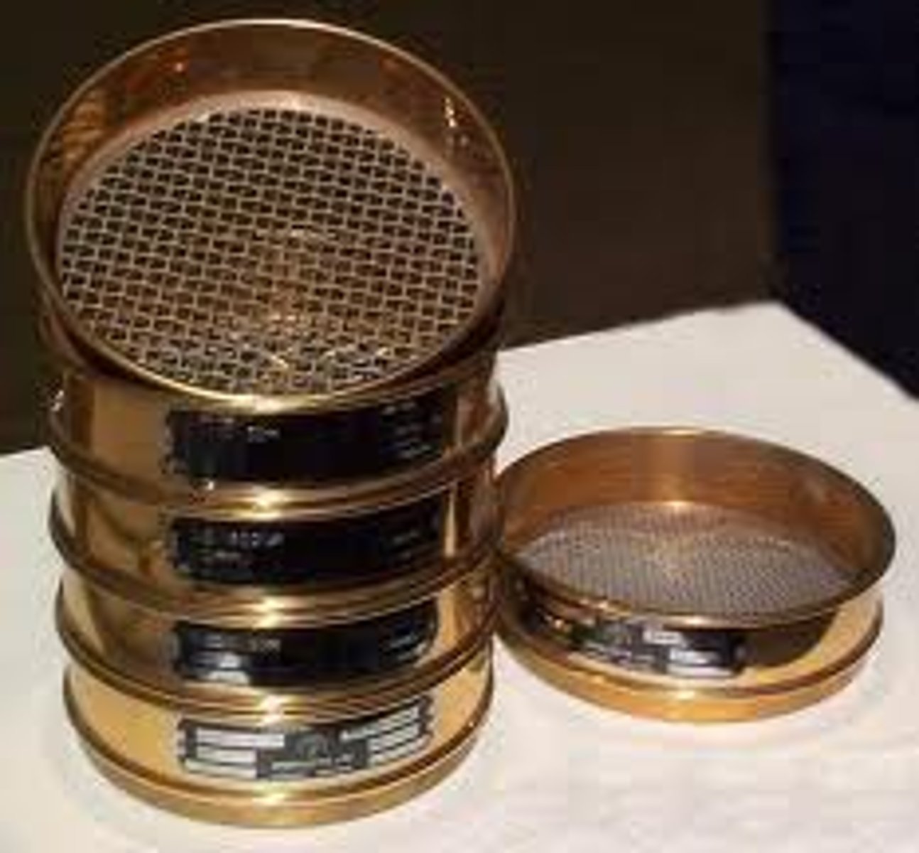 <p>Metal grills or sieves used to trap floating and suspended items such as plastic and paper items. These are then treated by incineration or disposed of in a landfill site</p>
