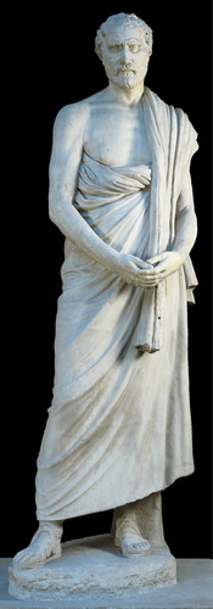 <p>- Athenian politician devoted to democracy: warned about Macedonians, was exiled, tried to get Athens to resist Alexander's successors' rule, Athens failed, he flees and commits suicide</p><p>- His unique physical traits are portrayed: weak and couldn't train in gym -> skinny arms; looks frail</p><p>- elderly man looking down, lost in thought</p><p>- shift away from idealized forms and expressionless faces</p>