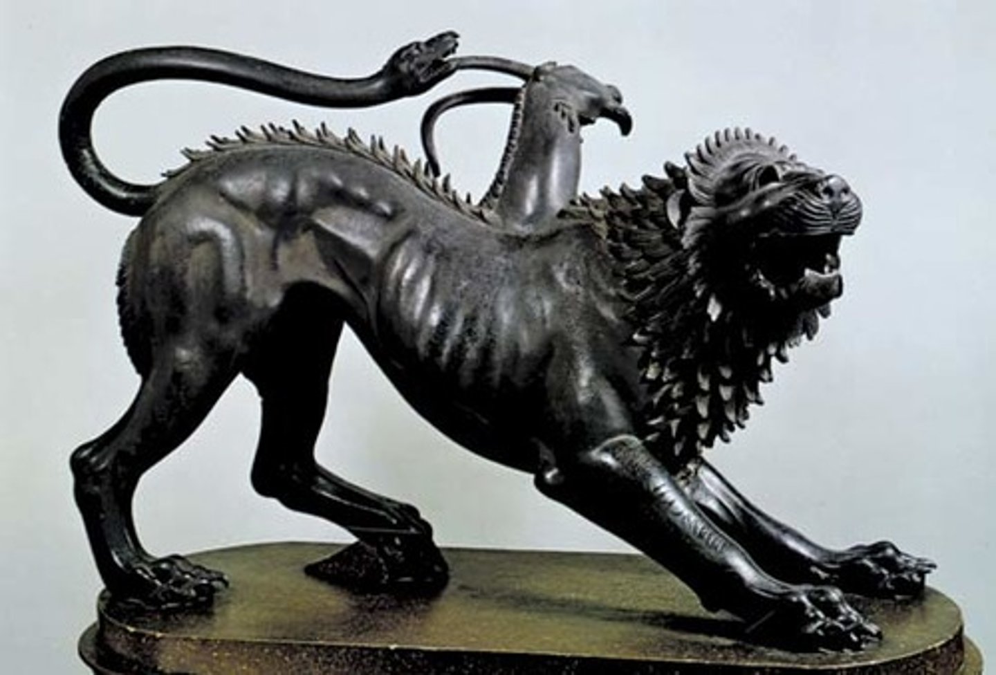 <p>composite ancient animal, lion's head and body, goat's neck springing from spine, snake for a tail, ETRUSCAN</p>