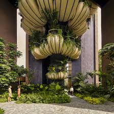 <p>Look at the picture of a beautifully designed building with artwork and plants.&nbsp; How does this design help with the Beauty Petal?</p>