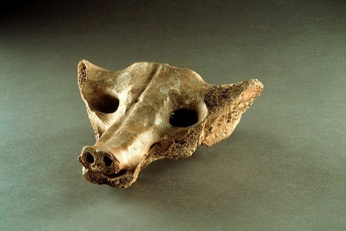 <p>-In the shape of a canine -Tequixquiac, Mexico -14,000-7,000 B.C.E. -Made of bone -Found by an engineer working on a drainage product</p>