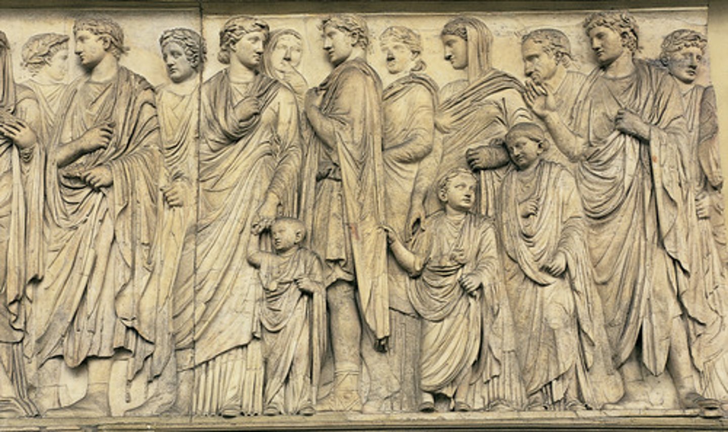 <p>The "Altar of Peace" (Ara Pacis) is an ancient Roman altar located in Rome, Italy, and it was dedicated in 13 BCE. It is a remarkable and well-preserved piece of Roman art and architecture.</p><p>Basic Information:</p><p>The Ara Pacis is a large rectangular altar made of white marble, and it was built to celebrate the return of Emperor Augustus from his military campaigns in Spain and Gaul.</p><p>The altar is adorned with intricate relief sculptures that depict various scenes and figures. The primary frieze on the exterior of the altar is the most famous, featuring a procession of figures, including members of the imperial family, priests, and other prominent individuals.</p>