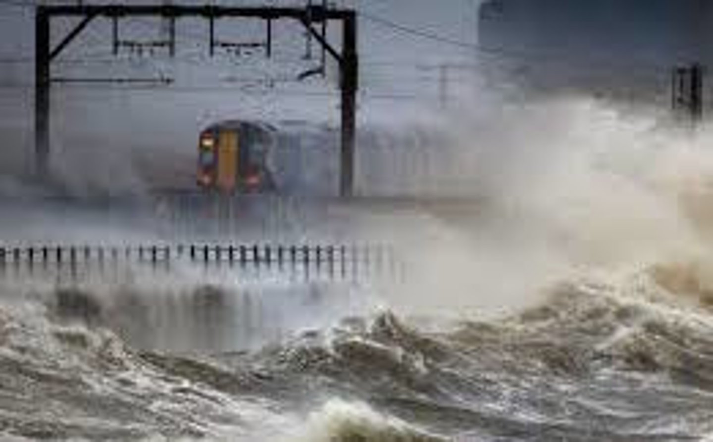 <p>the coastal flooding of an abnormally high seawater level associated with low pressure weather systems; also called a storm surge</p>