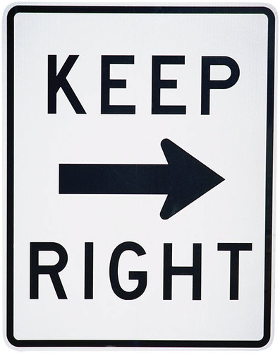 <p>A white and black rectangular sign with a black arrow pointing to the right; The driver should keep to the right</p>