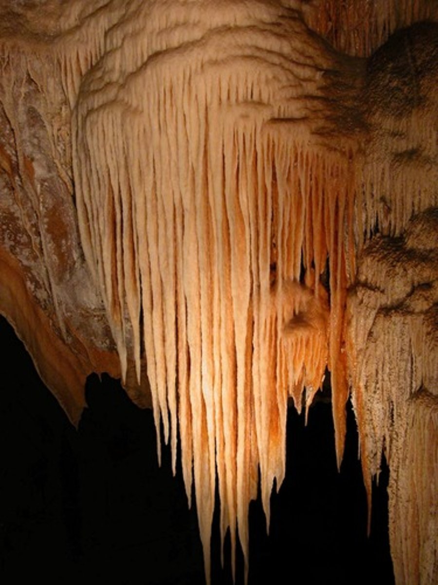 <p>limestone dissolved by acid that forms an upside down cone hanging from the ceiling</p>