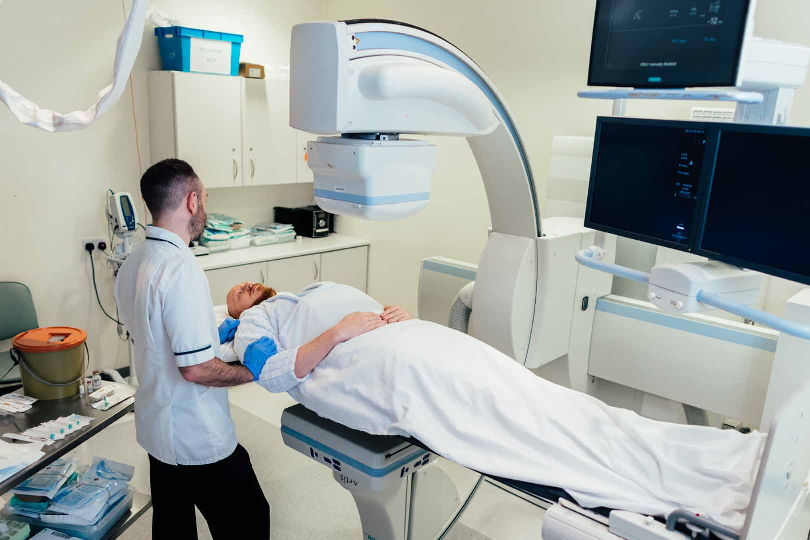 <p>- Uses a fluoroscope, a device that <strong><em>makes the shadows of x-rays visible</em></strong>, to provide real-time visualization of procedures. <br>- Exposes a patient to<strong><em> more radiation than routine radiography</em></strong> but often is used to guide needle biopsy procedures and nasogastric tube advancement.</p>