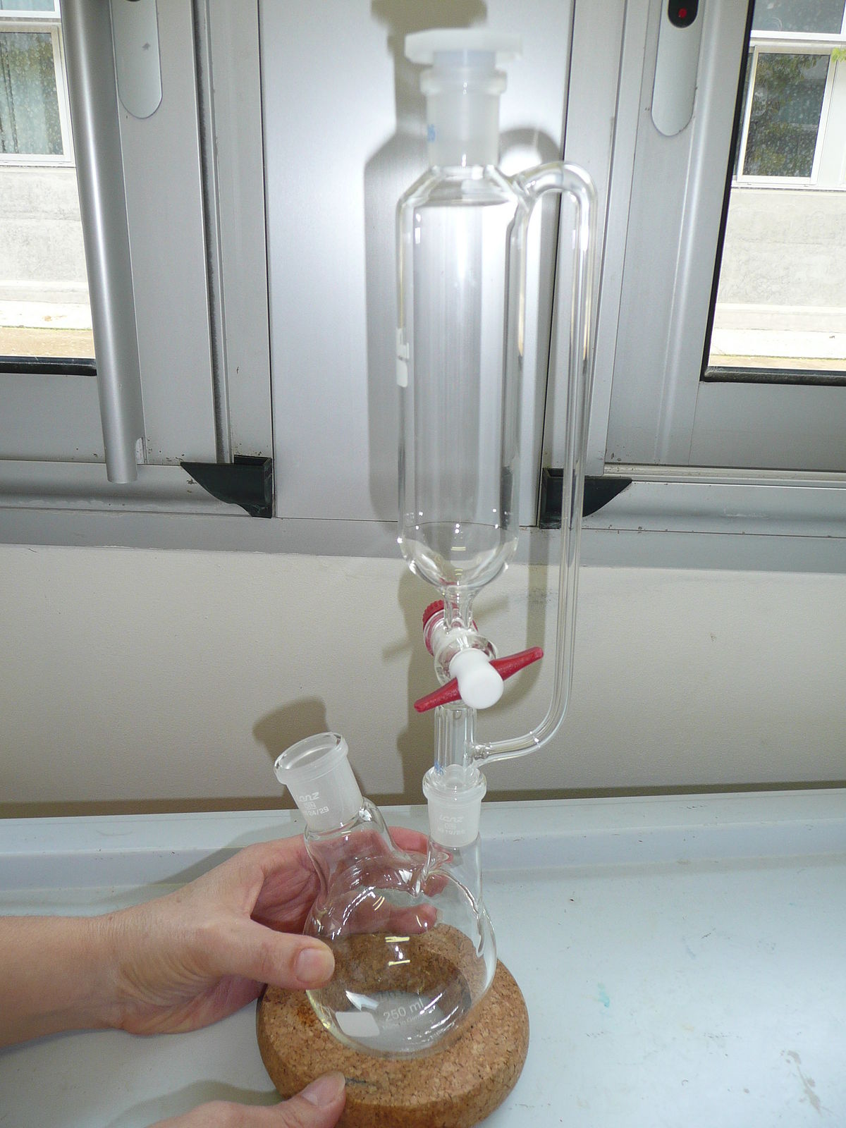 <p>Type of Funnel</p><p>Appearance - glass tube with a large cylindrical bulb in the middle, have a valve in the bottom, narrow at the bottom and have a wide opening at the top</p><p>Uses - transfer fluids, <em>used to add or drop liquids</em> to a reaction mixture, useful for adding reagents slowly</p><ul><li><p>stopcock (valve) allows the flow to be controlled</p></li><li><p>Pressure equalizing funnel, addition funnels</p></li><li><p>can be graduated or non-graduated</p></li></ul>