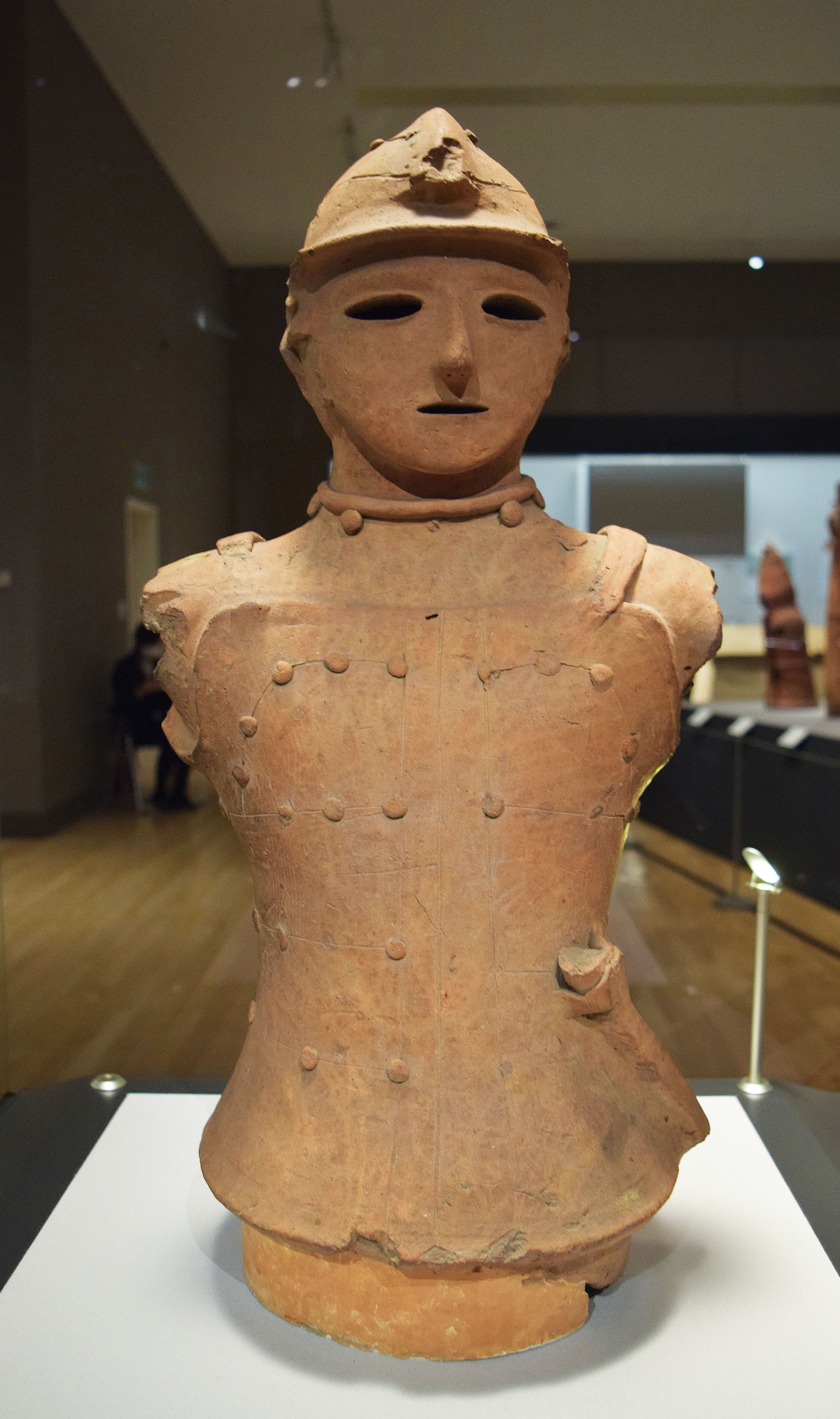 <p><span>Title: Haniwa Warrior in Armor</span><br><span>Period: 3rd - 6th century</span><br><span>Material: Earthenware</span></p>