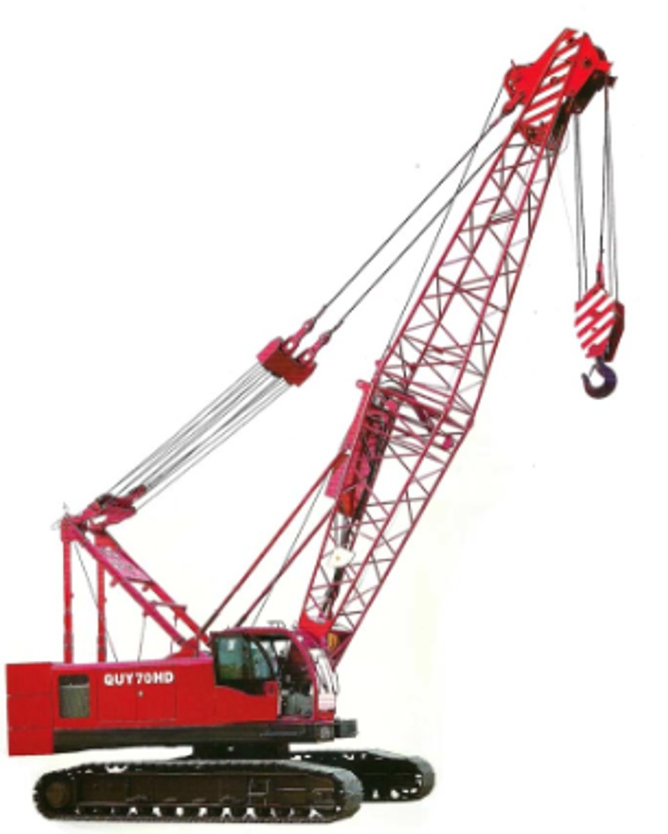<p>A tracked vehicle that "floats" on the soil and has a crane mechanism attached to it, can pick up and transfer a load, but hard to move between sites</p>