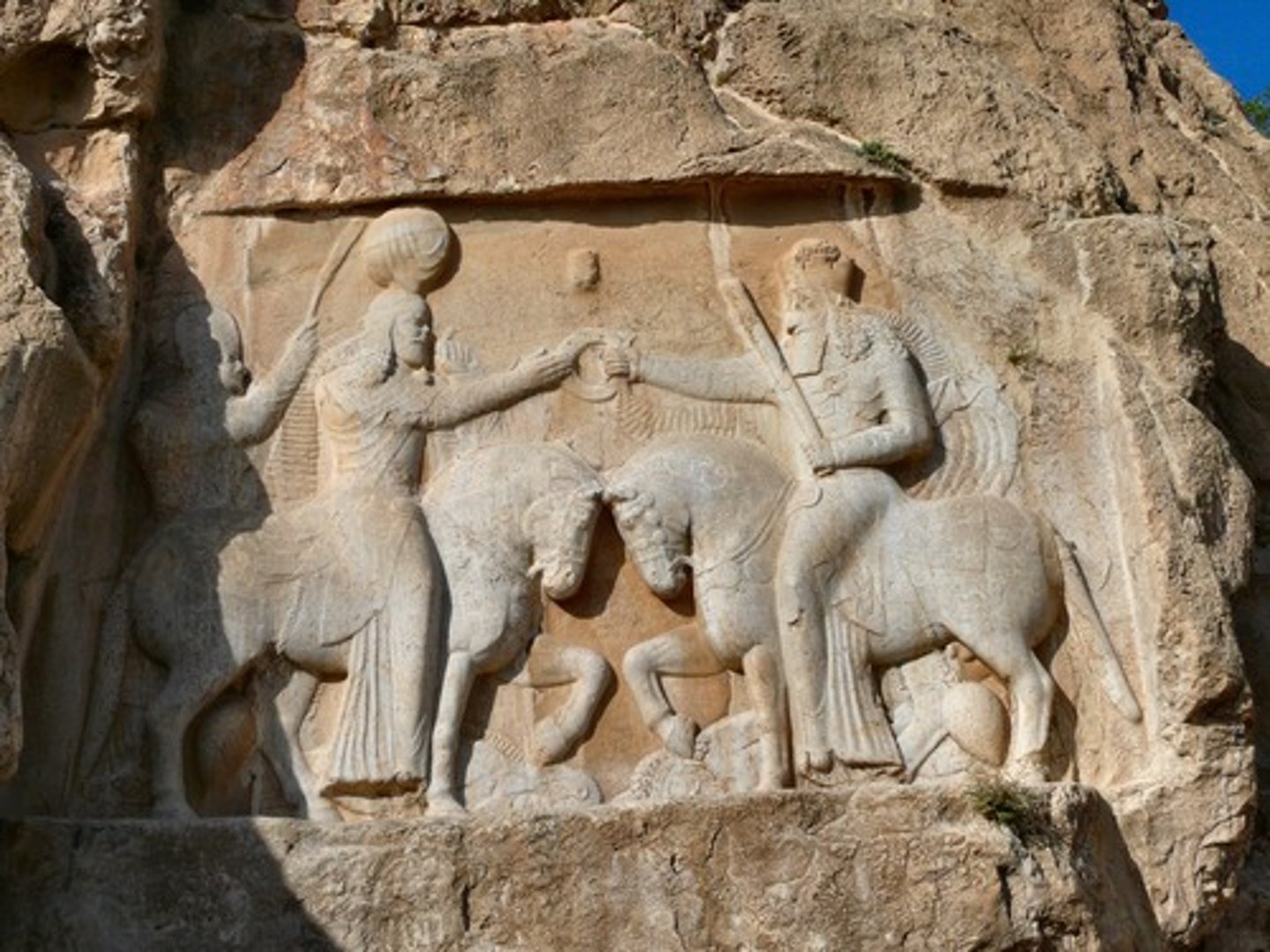 <p>a 3-D image or design whose flat background surface is carved away to a certain depth, setting off the figure; called low or high relief depending upon the extent of projection of the image from the background</p>