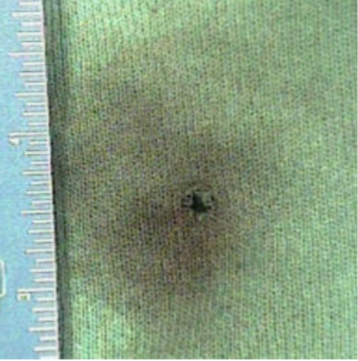 <p>halo of smoke-soot around hole</p>