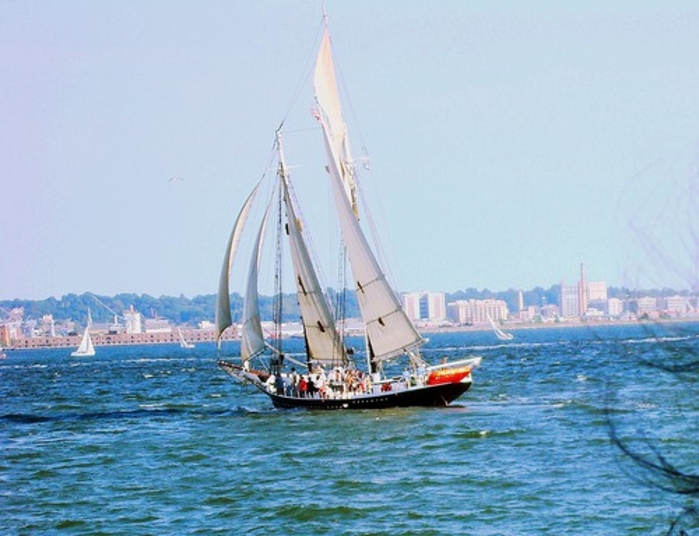 <p><span>to </span>travel<span> on or across an area of water in a </span>boat<span> or </span>ship:</p><p>"The boat sailed along/down the coast."</p>