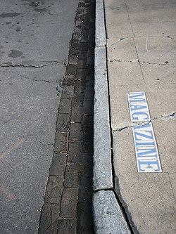<p>When parked facing uphill with a curb:</p>