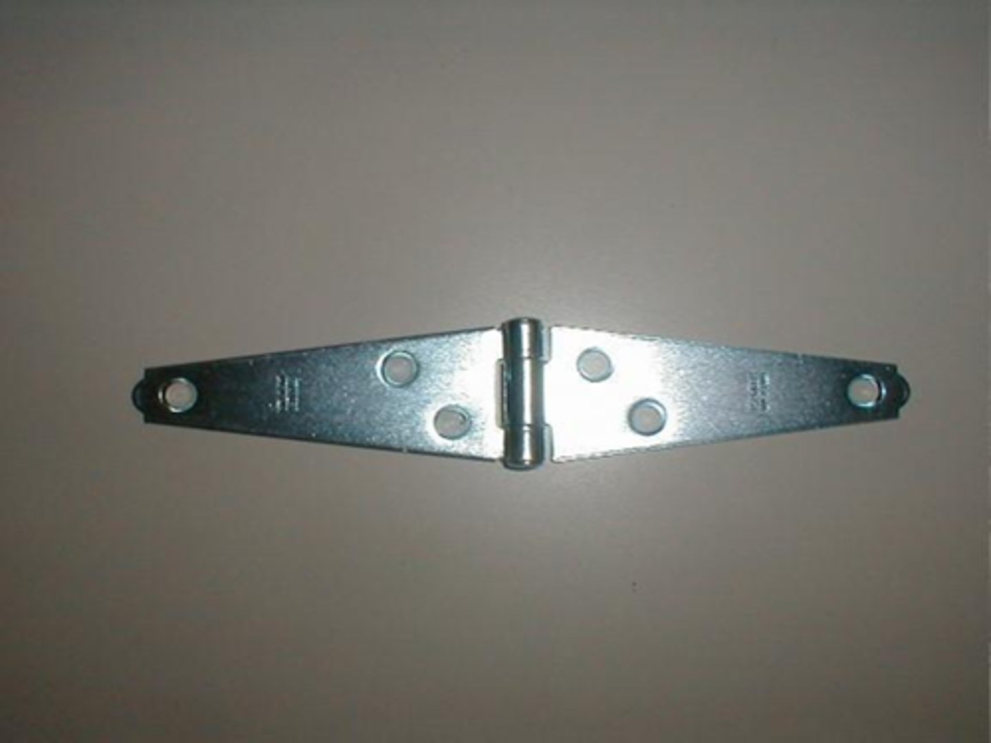 <p>A hinge having two long leaves for securing to the adjacent faces of a door and doorjamb</p>