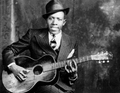 singer/guitar/loose form, MS delta