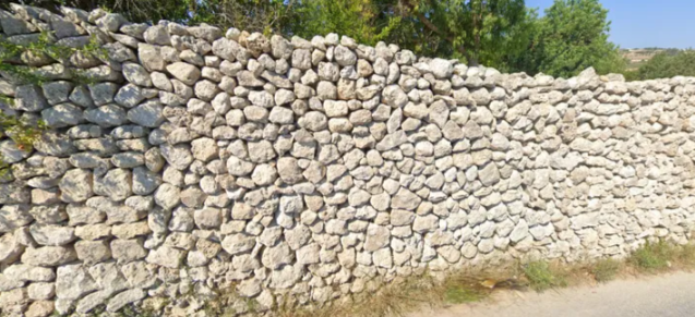 <p>Limestone rock wall</p>