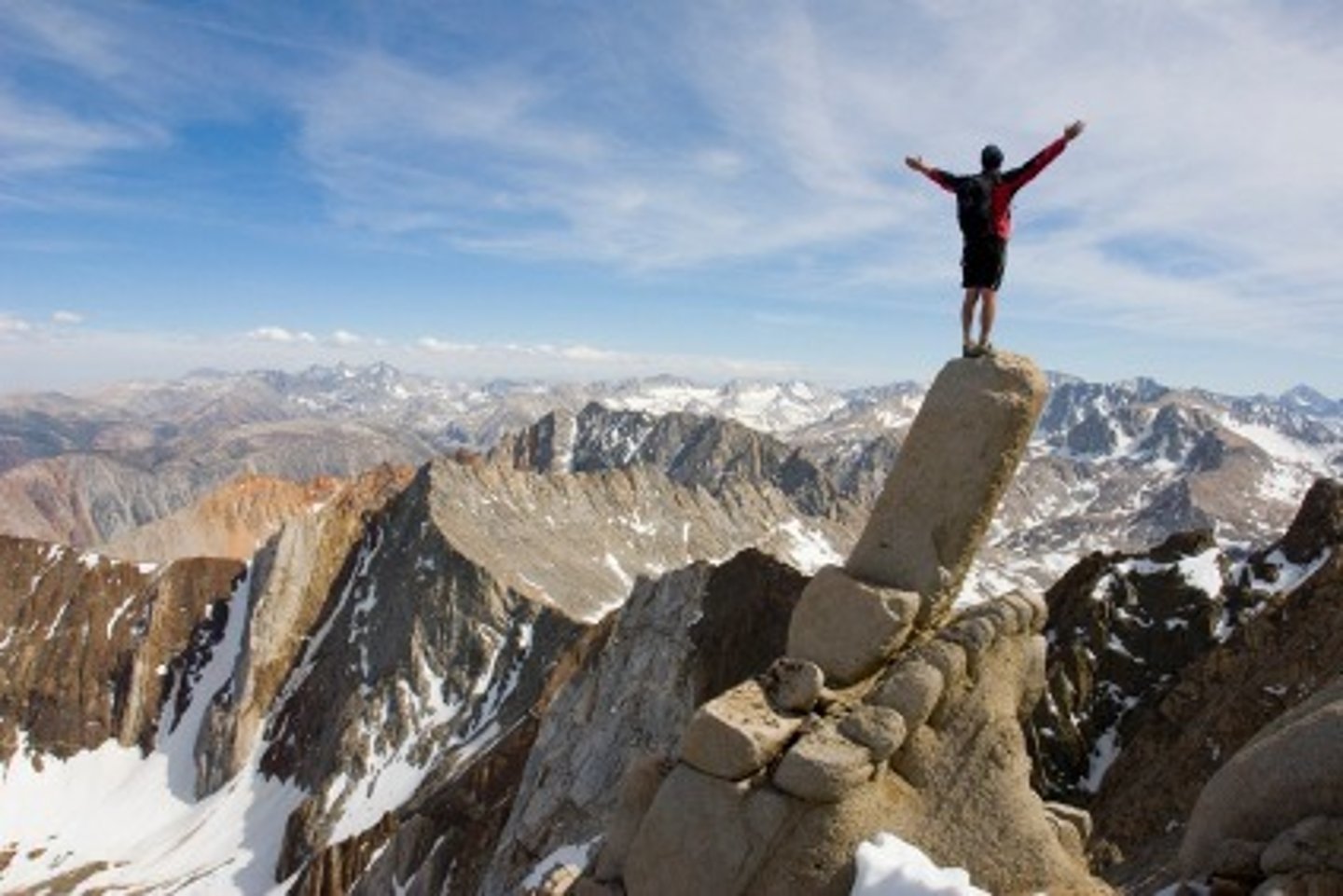 <p>He is on ________ of a mountain.</p>