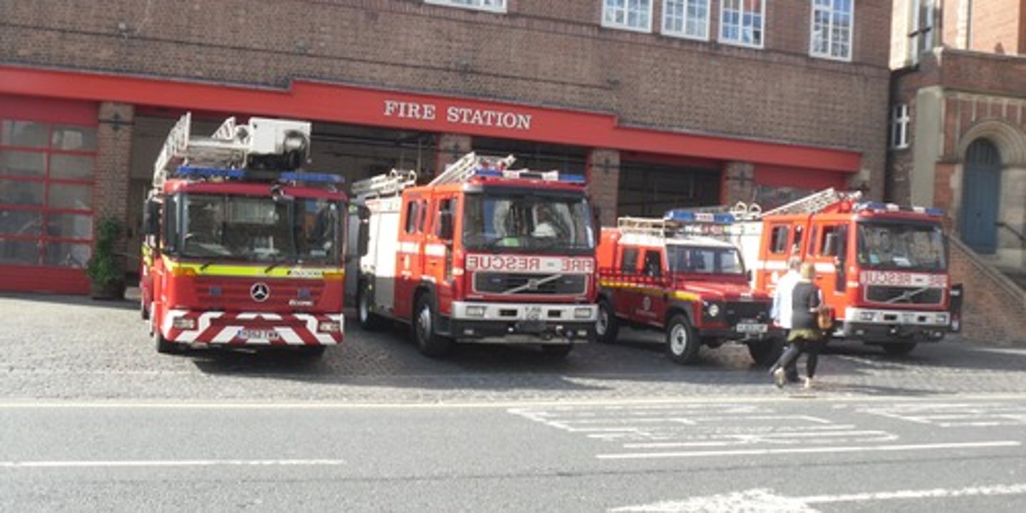 <p>fire station, firehouse</p>