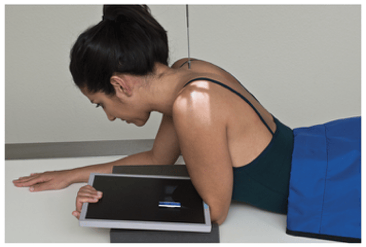 <p>- Humerus 15° to 20° to CR, which is perpendicular to IR</p><p>- Patient leaning forward slightly to place humerus 10 to 15 from vertical</p><p>- Turn head away from affected side</p><p>- Midanterior on humerus, carefully palpated</p>