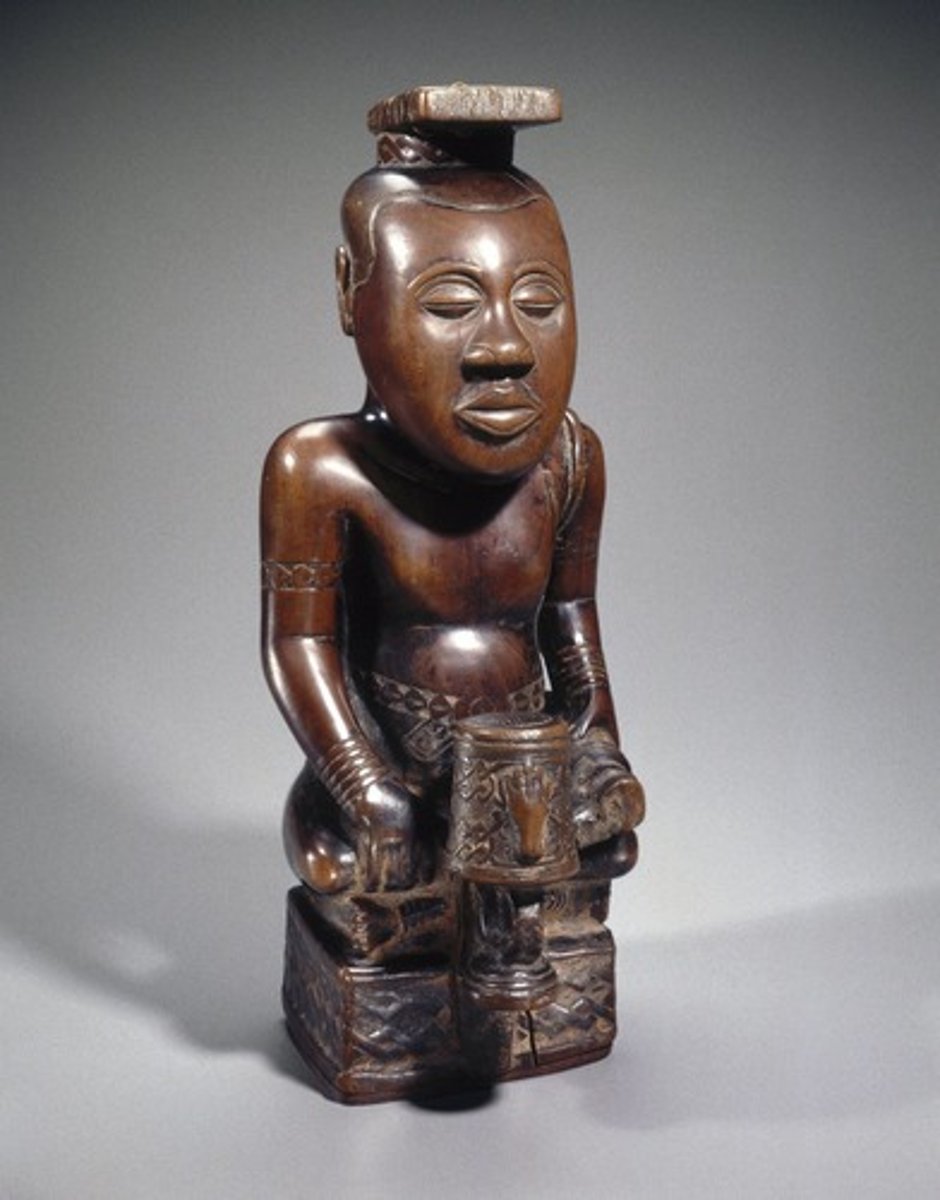 <p>Kuba Peoples</p><p>Democratic Republic of Congo</p><p>wood and camwood powder</p><p>commemorative (powerful and well respected ruler remembered in songs and statues)</p>