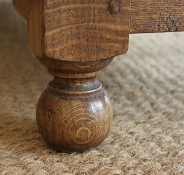 <p>Round, turned foot either terminating a leg or serving independently as a support for a case piece; May be spherical, or it may be ovoid with a vertical axis</p>